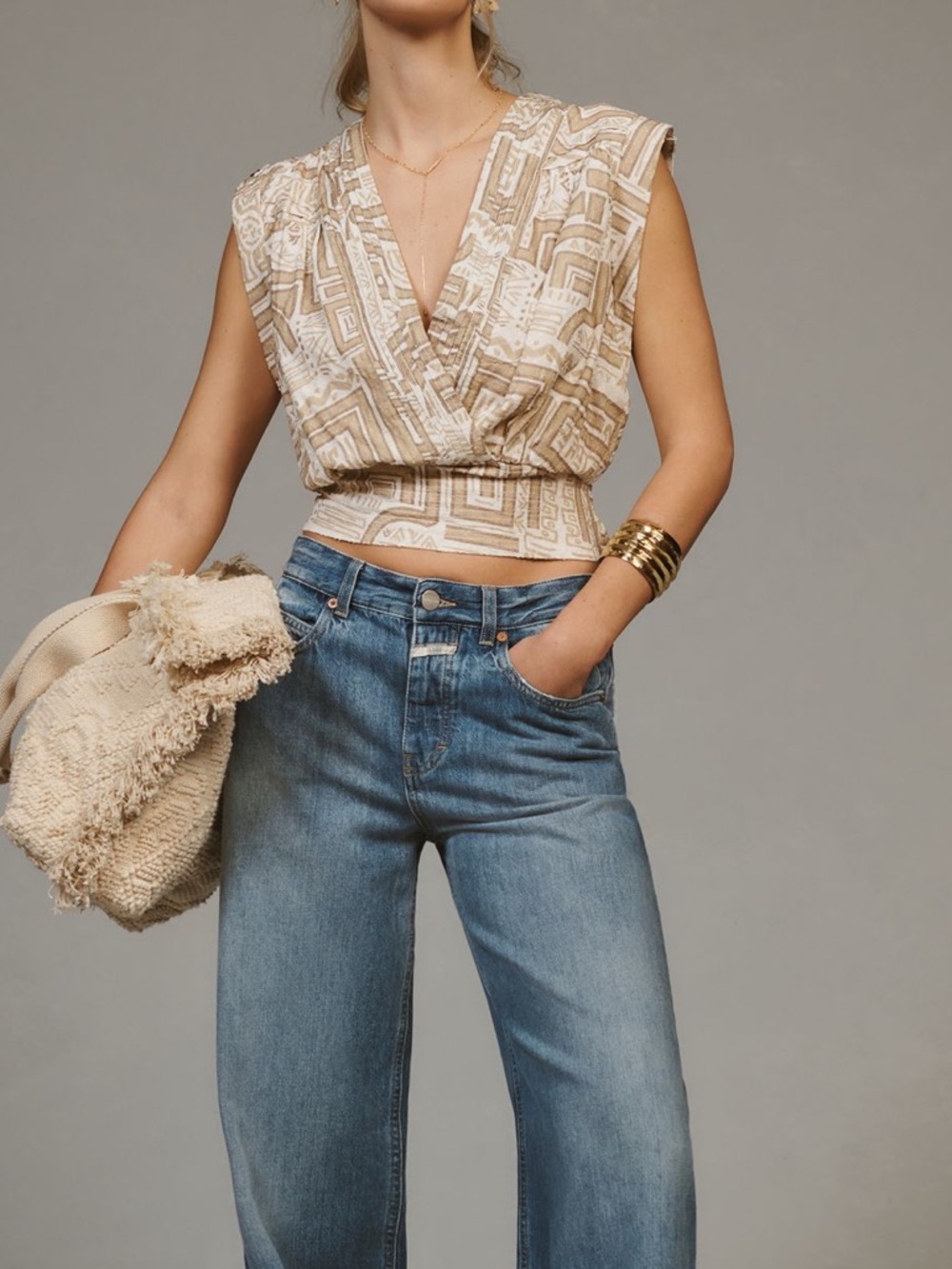 By Anthropologie Sleeveless Faux Wrap Top Neutral never worn.